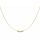 Goldene Halskette mit Perlen