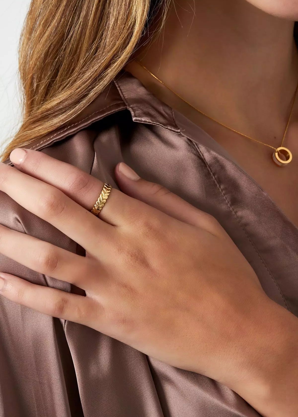 Ring mit verschlungenen Herzen in Gold
